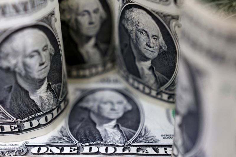 Dollar lower after revised data shows the US economy is growing more slowly than expected